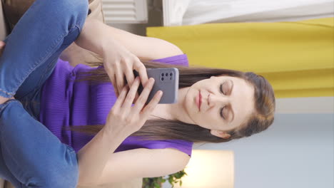 Vertical-video-of-Disappointed-woman-in-messaging.
